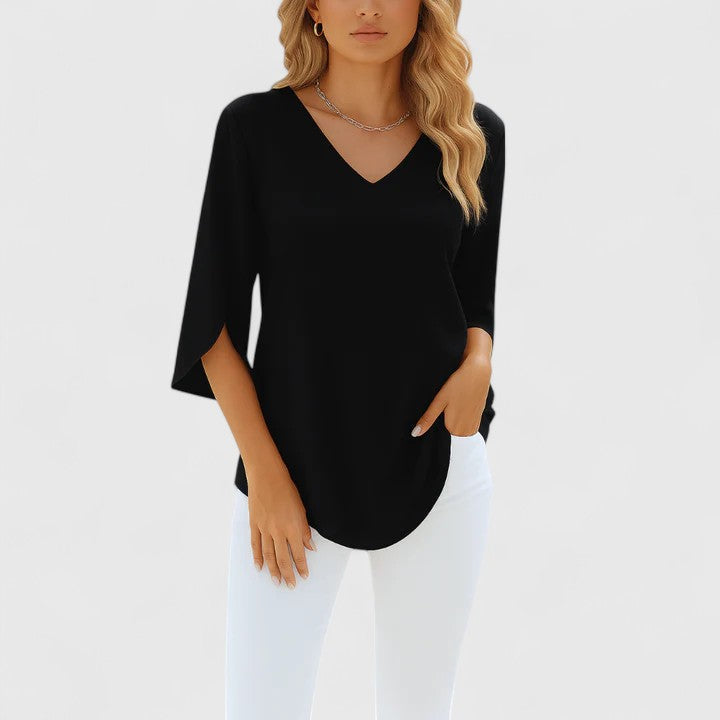 Chic colorful V-neck blouse for women. Sophisticated style & comfort for summer fashion.