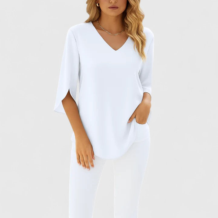 Sophisticated V-neck blouse for women, offering effortless style. Elegant & comfortable for summer.