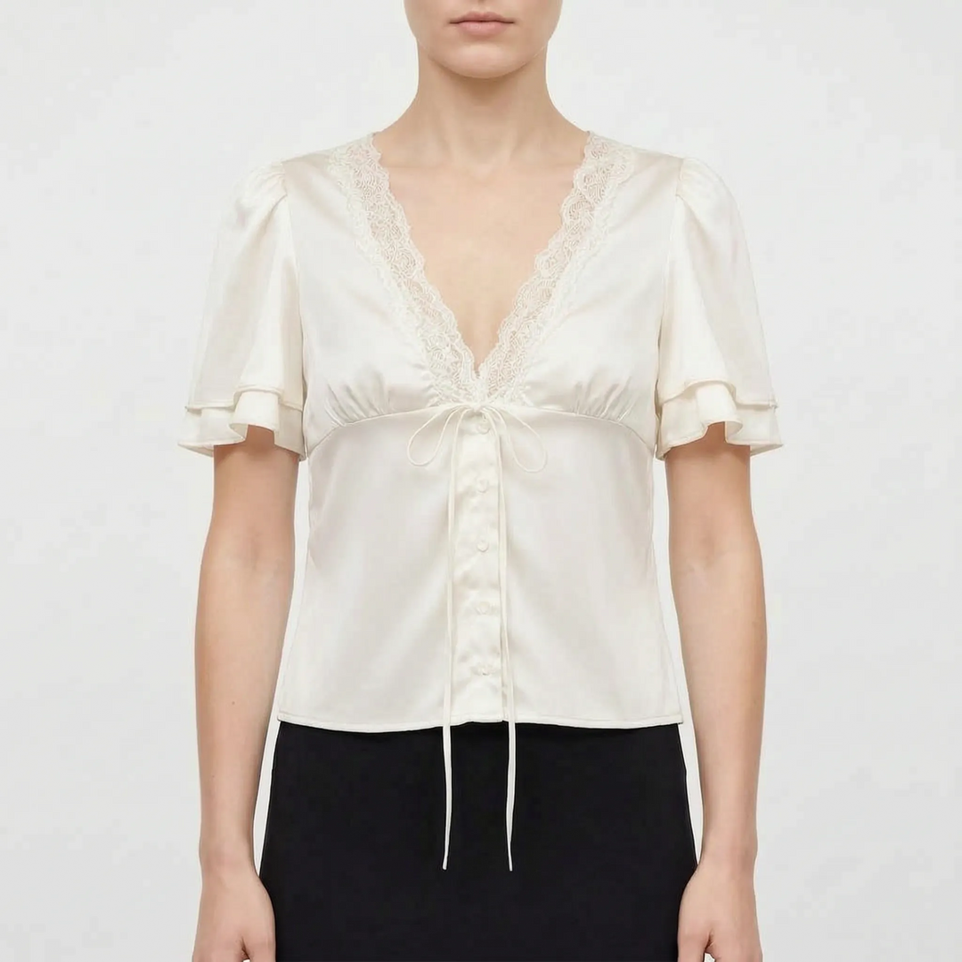 Stylish women's lace-trim V-neck blouse, short sleeve design. A versatile and elegant top for seamless day to night transitions.