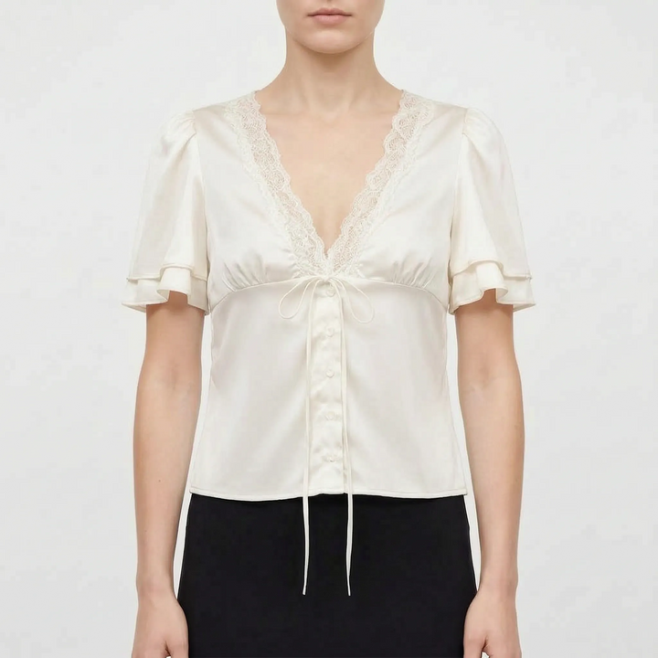 Stylish women's lace-trim V-neck blouse, short sleeve design. A versatile and elegant top for seamless day to night transitions.
