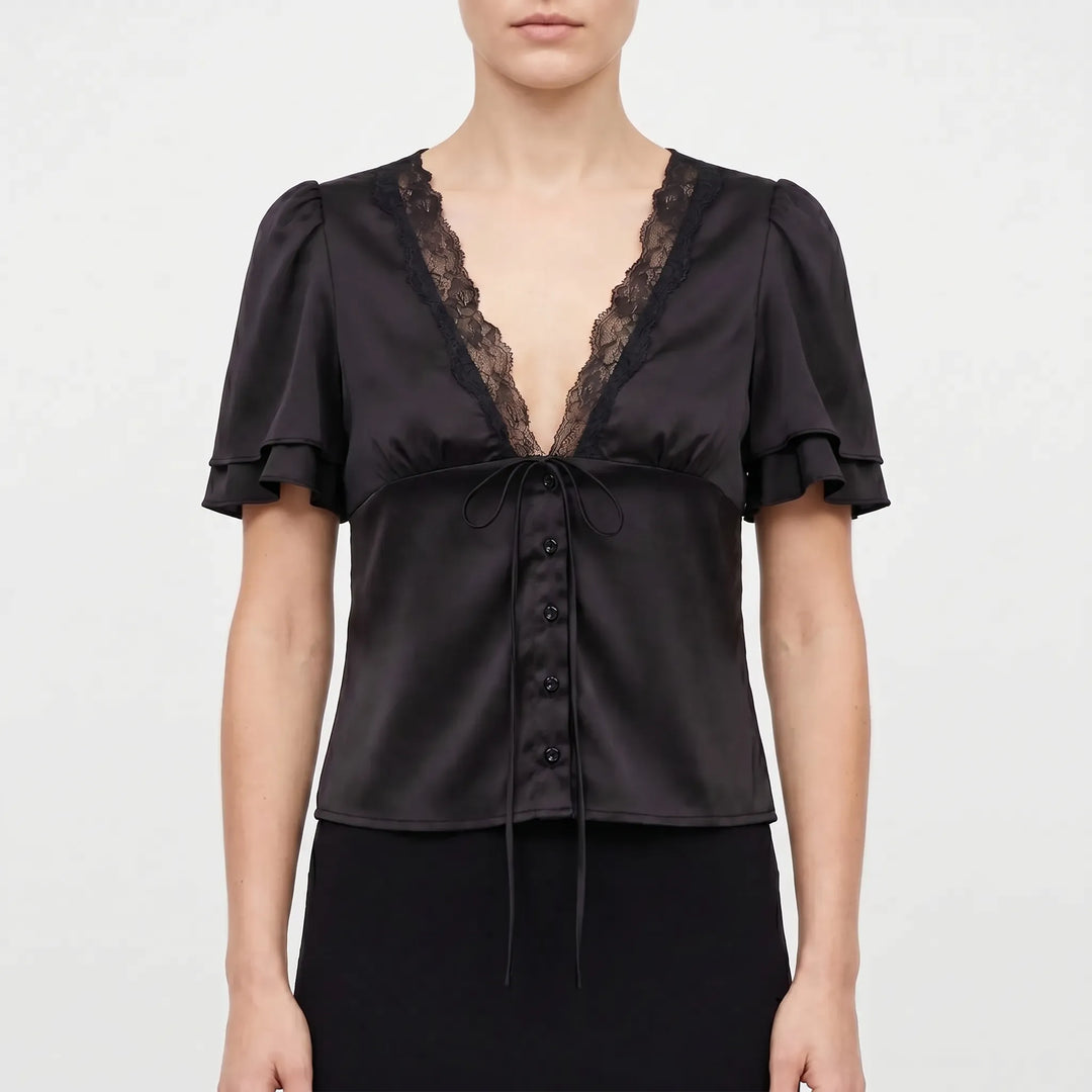 Sophisticated women's lace-trim V-neck top with short sleeves. A chic and versatile blouse ideal for any day to night look.
