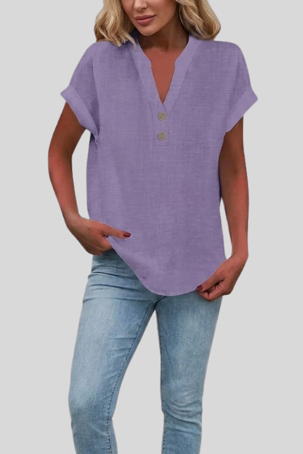 Women's fashionable V-neck short sleeve blouse. Button-down style is ideal for versatile work & casual outfits.