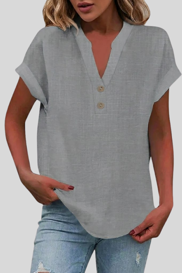 Stylish short sleeve V-neck button-down blouse for women. Versatile for office & casual wear.