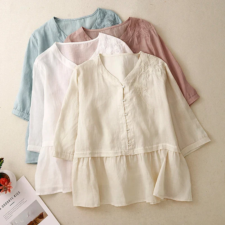 Stylish women's button-front blouse with V-neck, ideal for spring fashion, workwear, or elegant everyday wear.