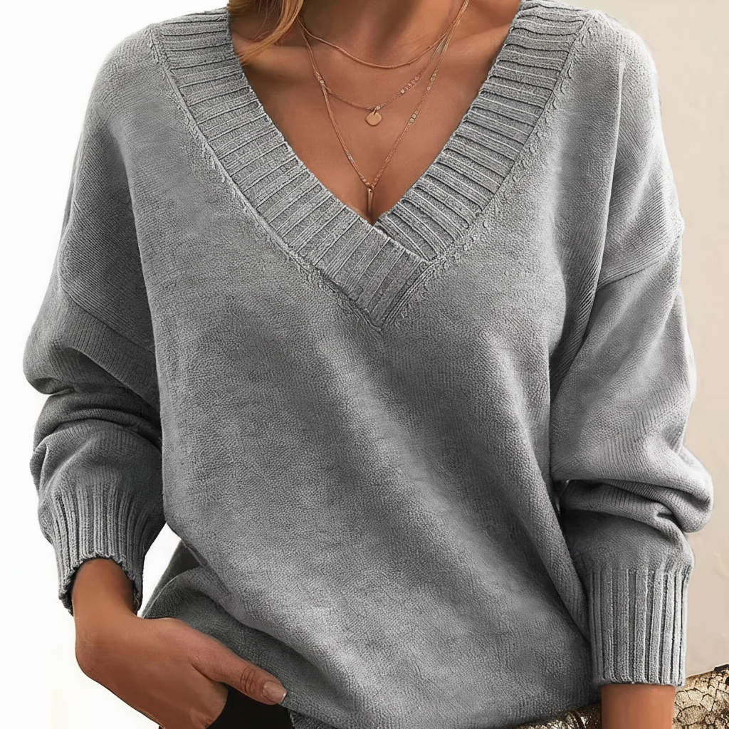 Women's pink V-neck cashmere blend sweater, a cozy and elegant choice for cool weather