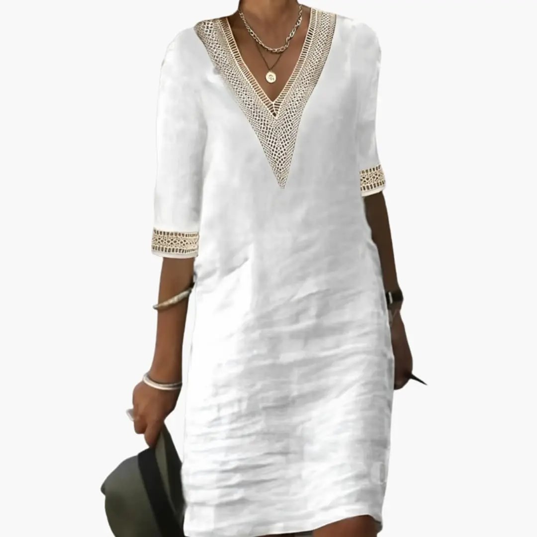 Elegant women's V neck casual shift midi dress. Perfect for summer, vacation, or a chic day out. Relaxed fit.