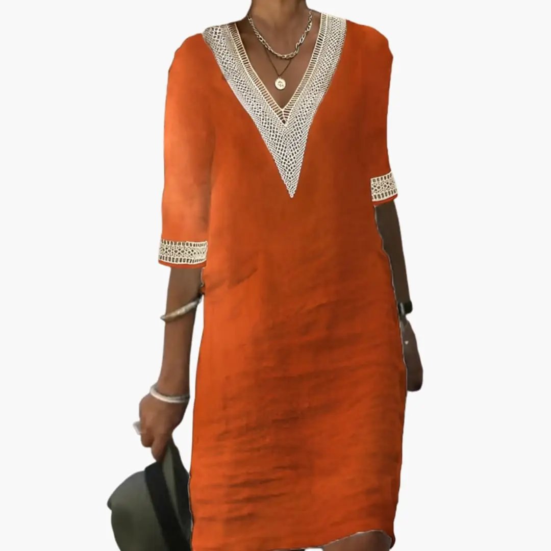 Casual women's shift midi dress with V-neck. Ideal relaxed fit for summer days, vacation, or everyday wear.