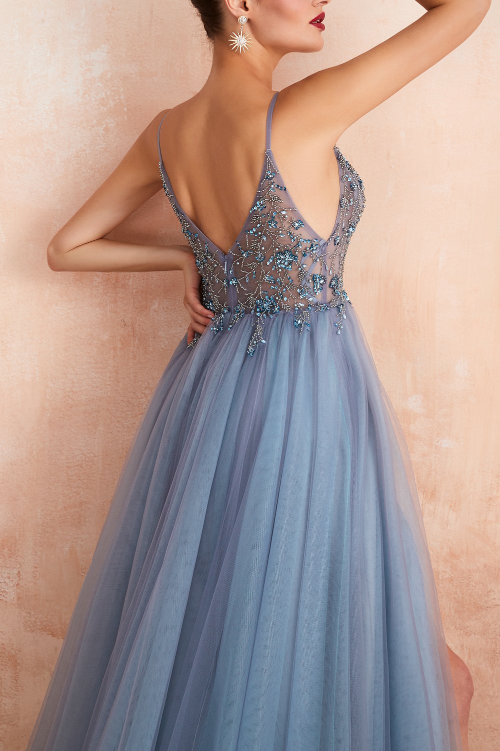 Pink women's elegant V-neck formal gown with a high slit, a stunning choice for special events.