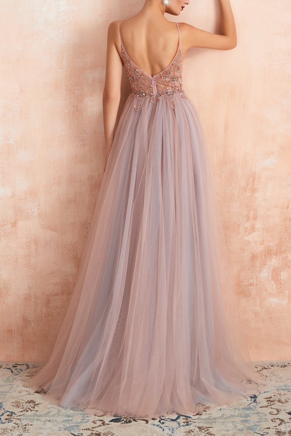 Women's elegant V-neck tulle evening dress with a stylish slit, ideal for any formal party.