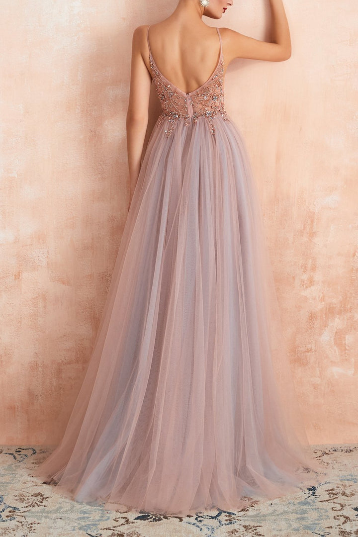 Women's elegant V-neck tulle evening dress with a stylish slit, ideal for any formal party.