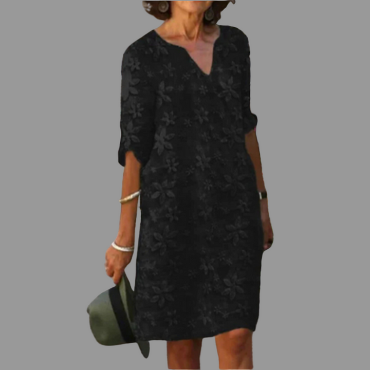 White floral print V-neck midi dress for women, ideal for casual summer outings & elegant events.