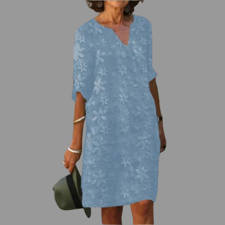 Comfortable V-neck floral midi dress for women, featuring a vibrant print, great for summer fashion.