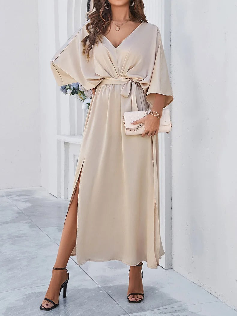 Elegant women's V-neck flowy maxi dress, perfect for spring casual or party wear. Comfortable long summer style.