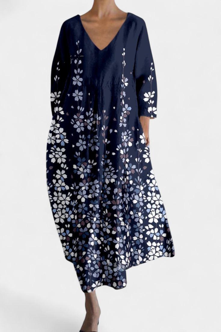 Day dress: women's V-neck flowy summer style, offering comfort and an elegant feel.