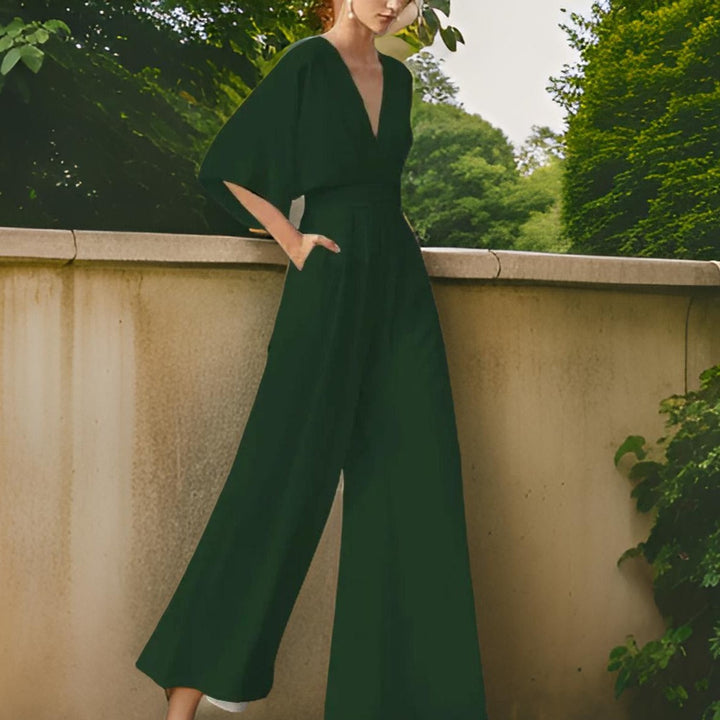 Women's elegant V-neck jumpsuit, three-quarter sleeve design. Versatile for summer, party, or formal outfits.