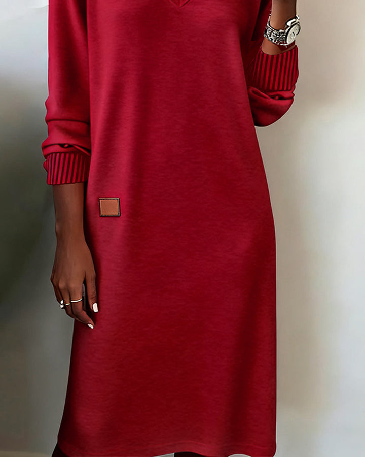 Stylish red V-neck long sleeve midi dress, perfect for making a statement at work or everyday.
