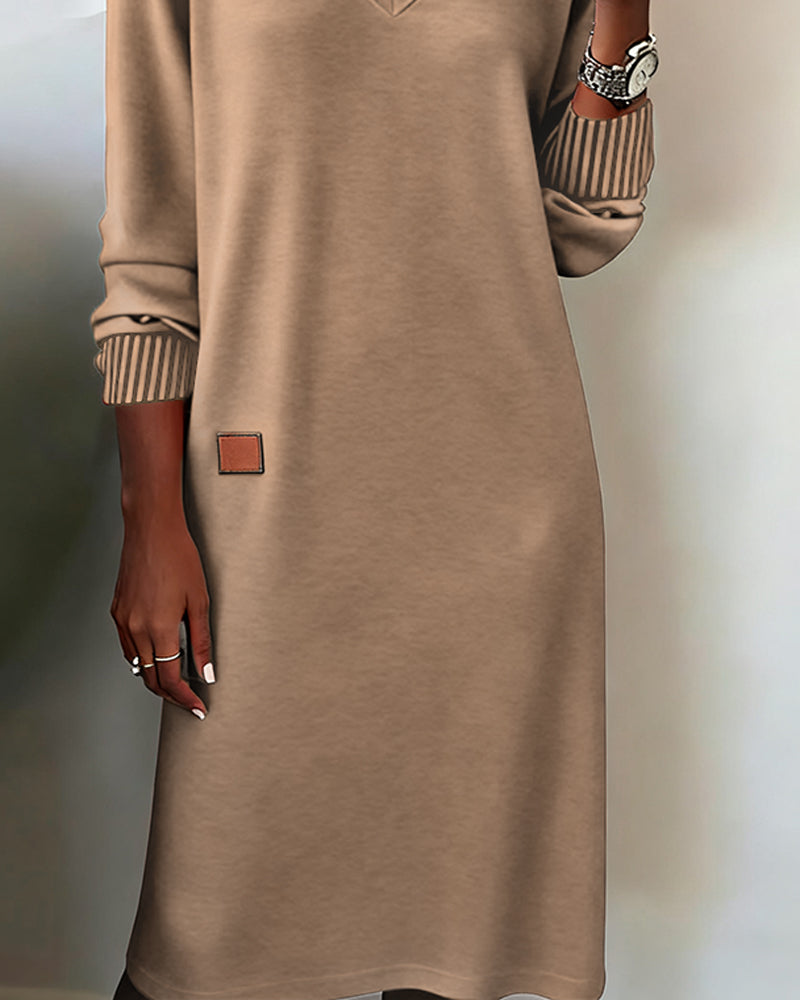 Professional women's long sleeve V-neck midi dress, ideal for sophisticated office & business attire.