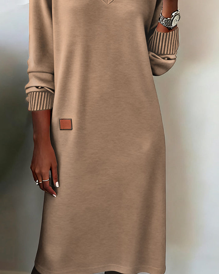 Professional women's long sleeve V-neck midi dress, ideal for sophisticated office & business attire.