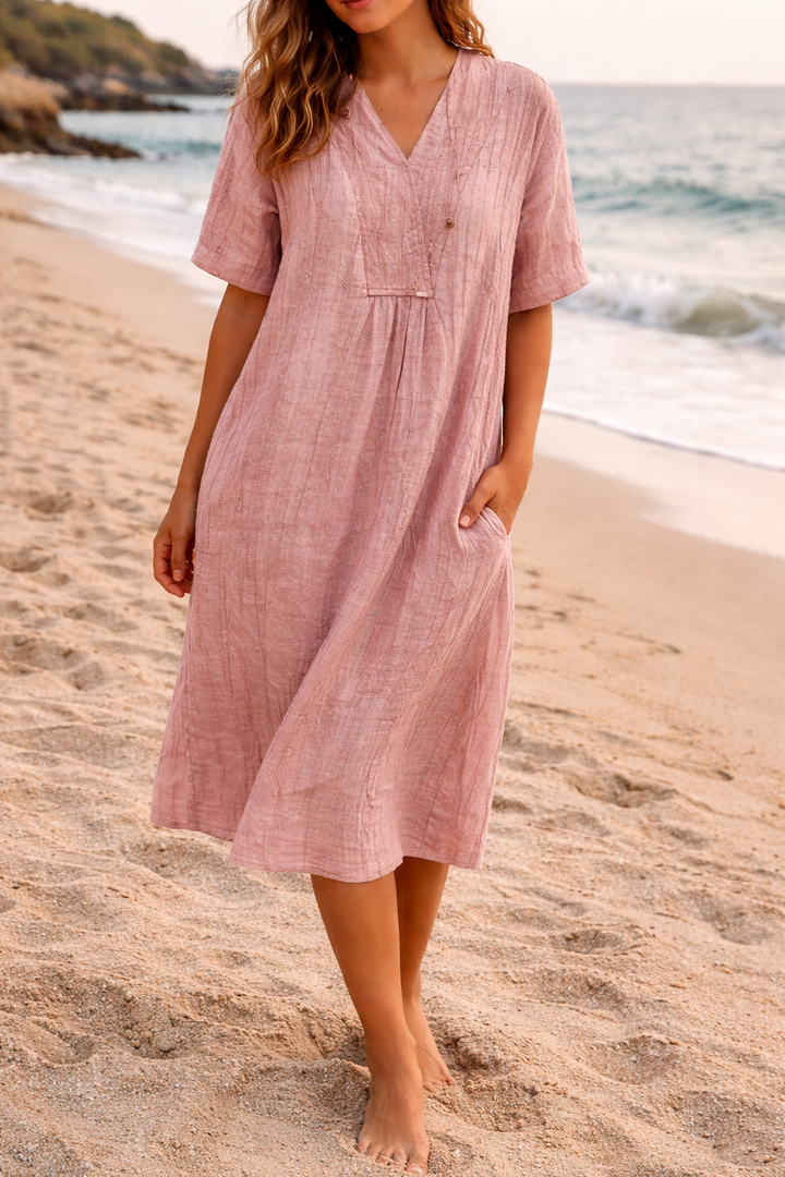 Elegant women's V-neck loose fit midi dress for summer comfort. Flowy short-sleeve casual vacation wear.