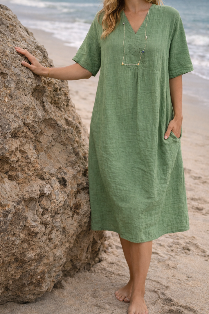 Comfortable women's short-sleeve V-neck midi dress. Perfect casual everyday or vacation summer outfit.