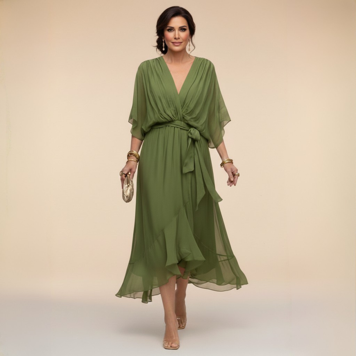 Elegant women's V-neck maxi dress, perfect for evening wear or special occasions. Flowing, comfortable design.
