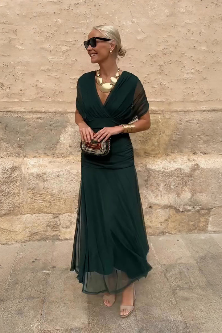 Elegant women's V-neck maxi dress with flutter sleeves, perfect for summer parties & special occasions.