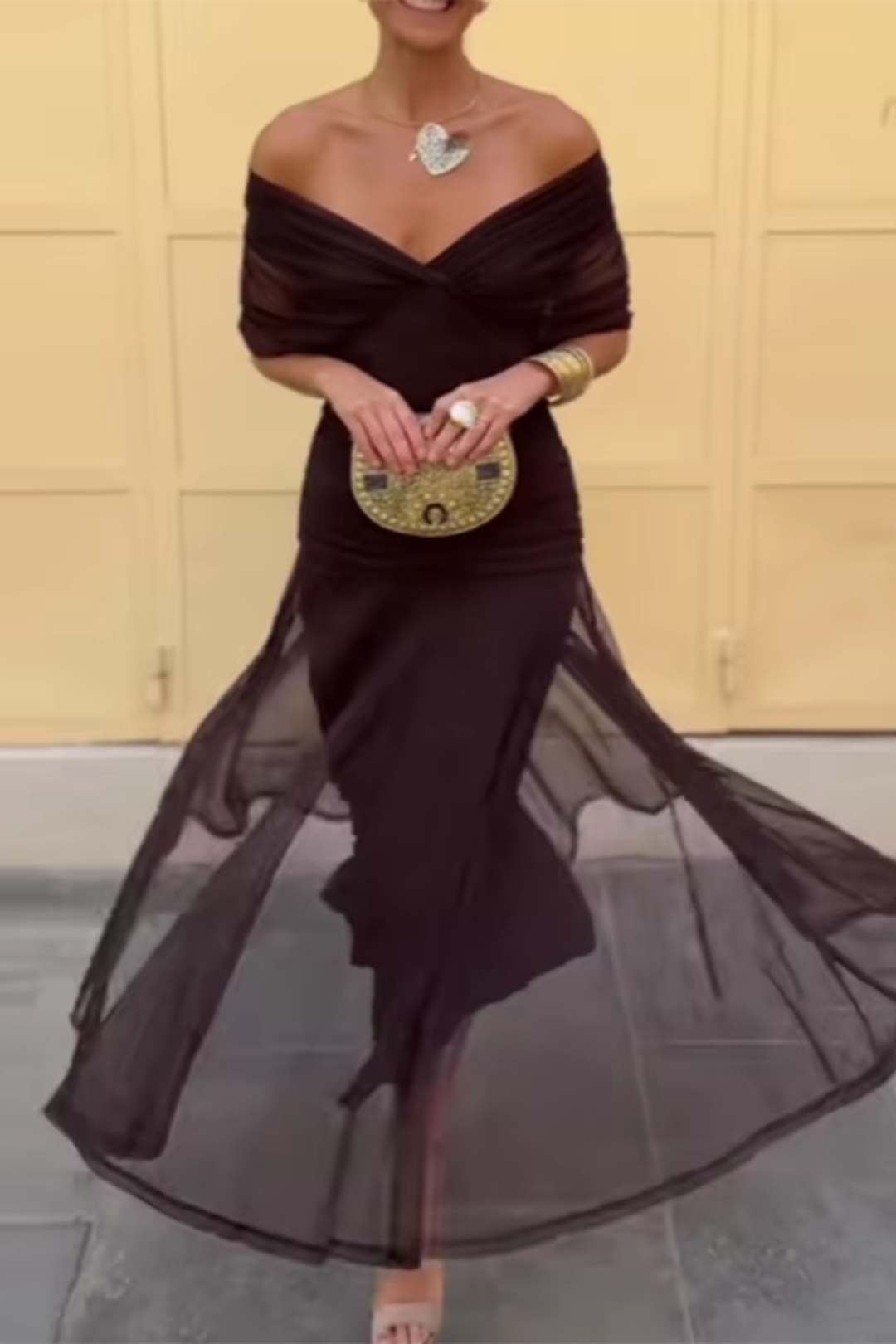 Luxurious V-neck maxi dress for women, with elegant flutter sleeves. Ideal for evening wear & special events.