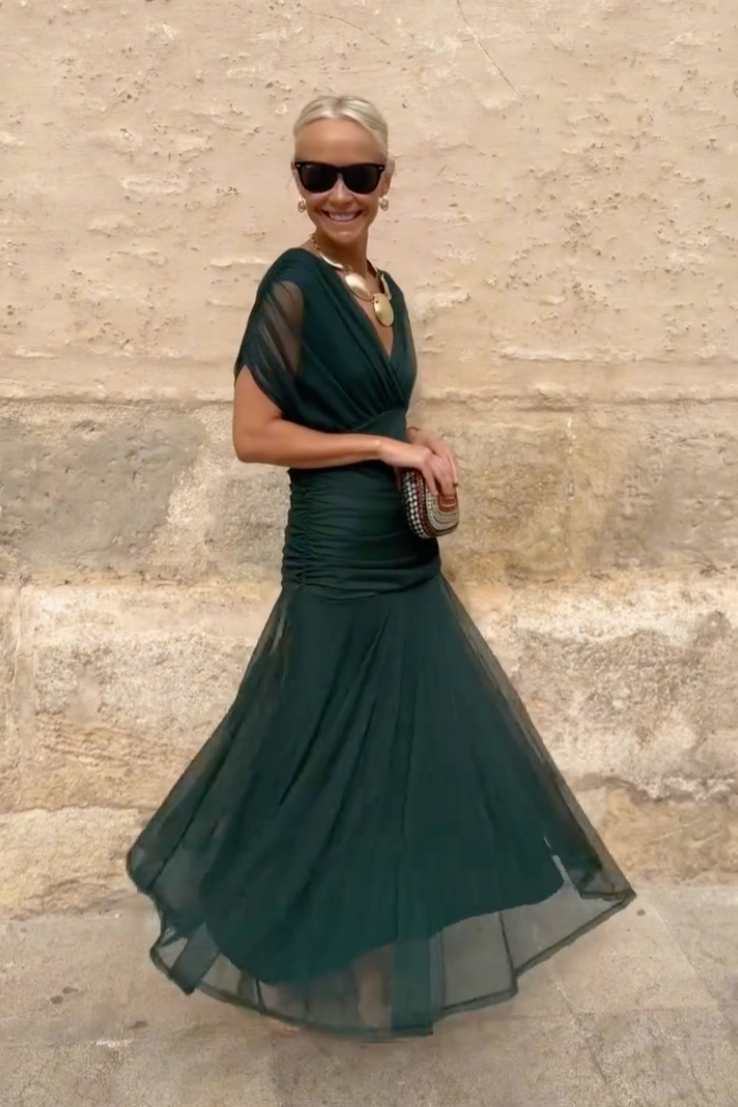 Summer V-neck maxi dress for women, light & airy with stylish flutter sleeves. Great for warm weather parties.