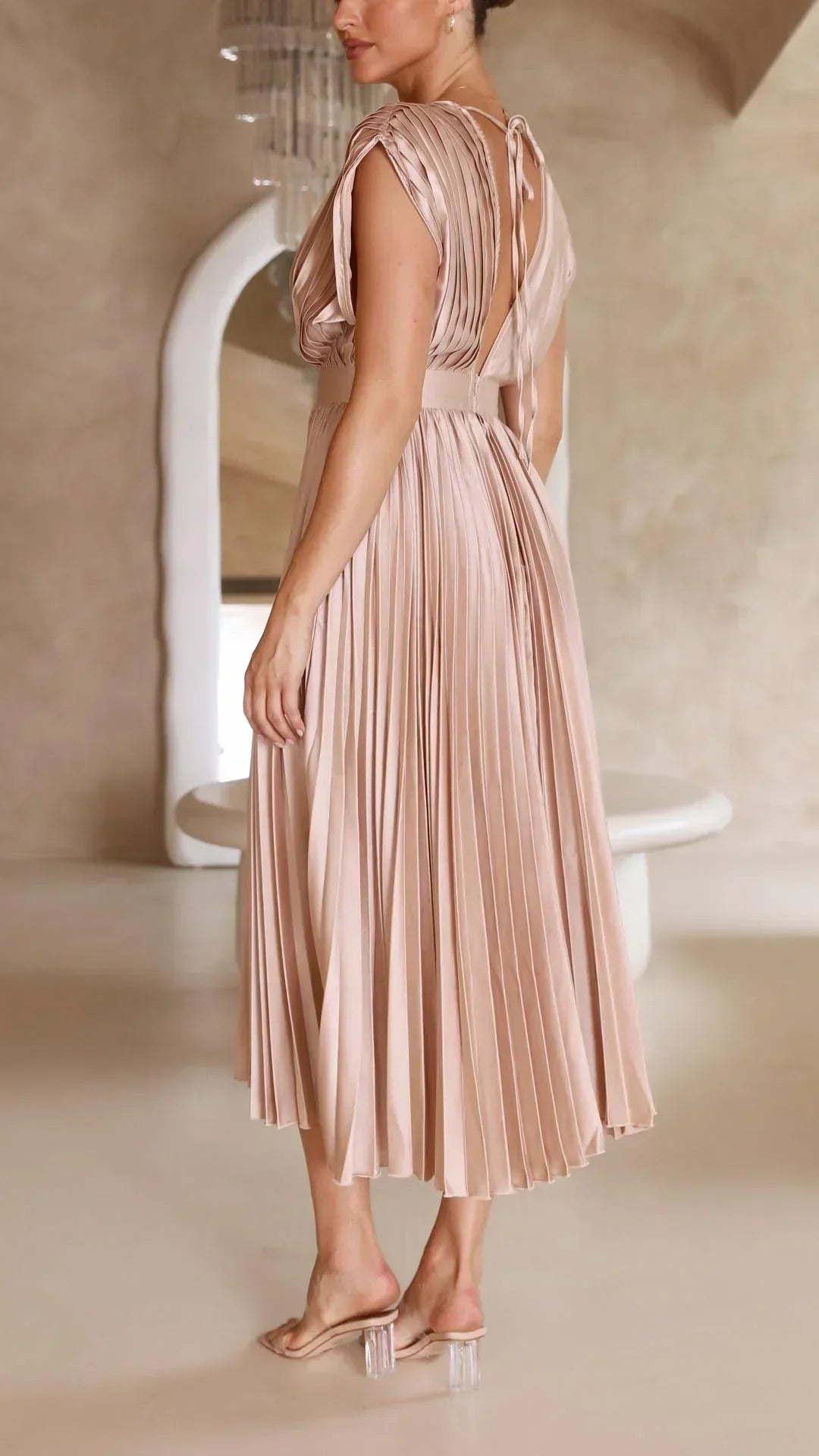 Flattering V-neck women's midi dress featuring an elegant adjustable tie back for a perfect silhouette.