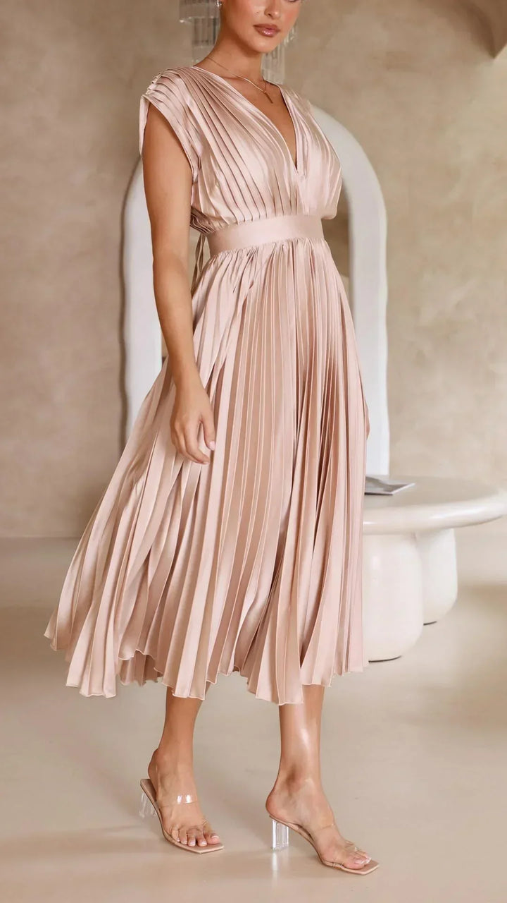 Modern & stylish women's V-neck dress with a trendy adjustable tie back, ideal for fashion-forward women.