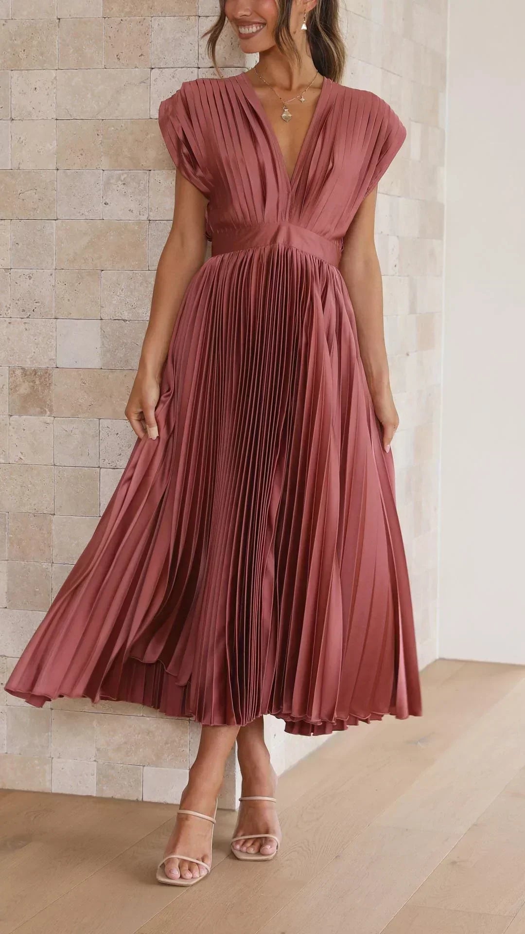 Midi-length women's V-neck dress with an adjustable tie back, a trendy & comfortable summer staple.