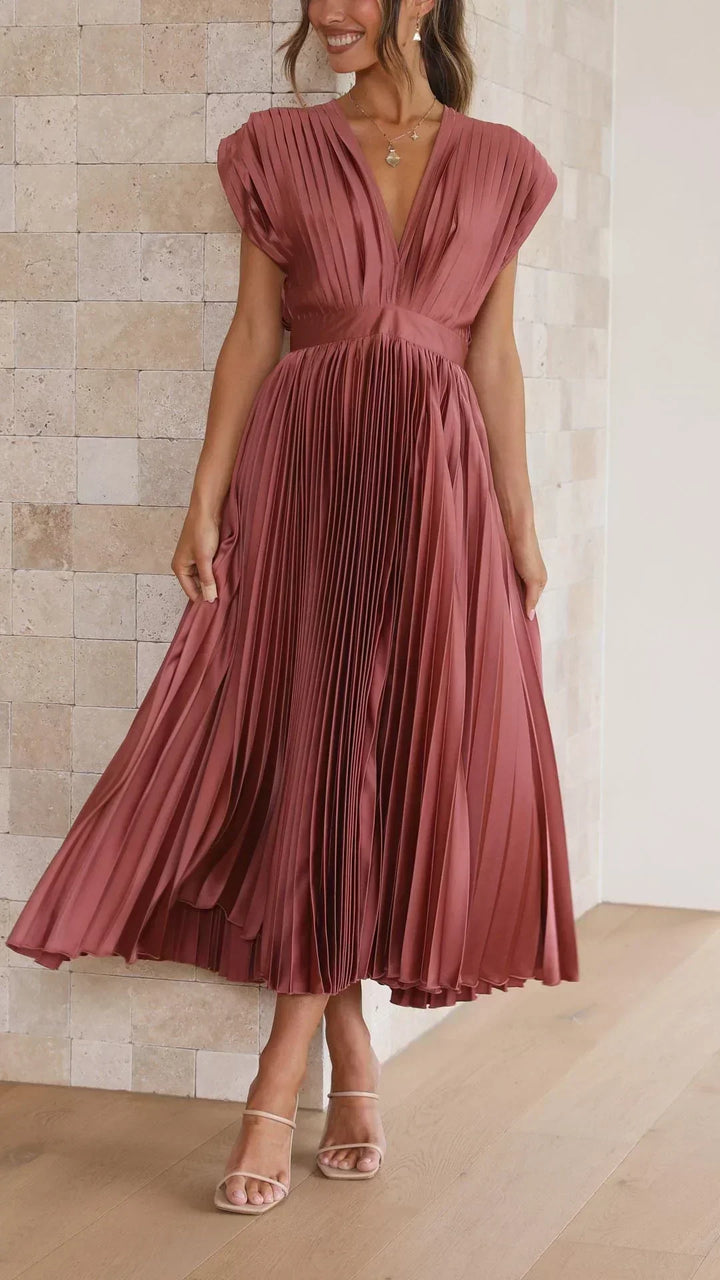 Midi-length women's V-neck dress with an adjustable tie back, a trendy & comfortable summer staple.