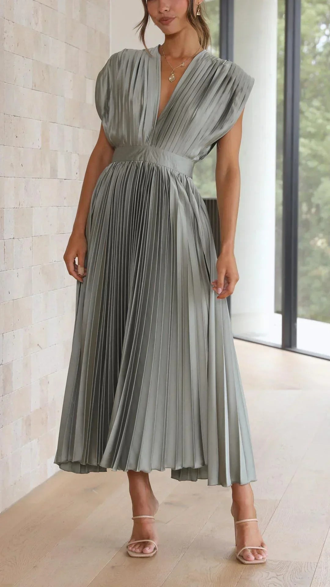 Trendy V-neck women's dress with chic adjustable tie back closure, ideal for summer fashion & events.