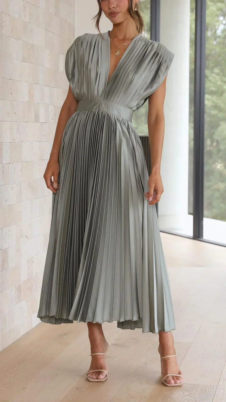 Trendy V-neck women's dress with chic adjustable tie back closure, ideal for summer fashion & events.