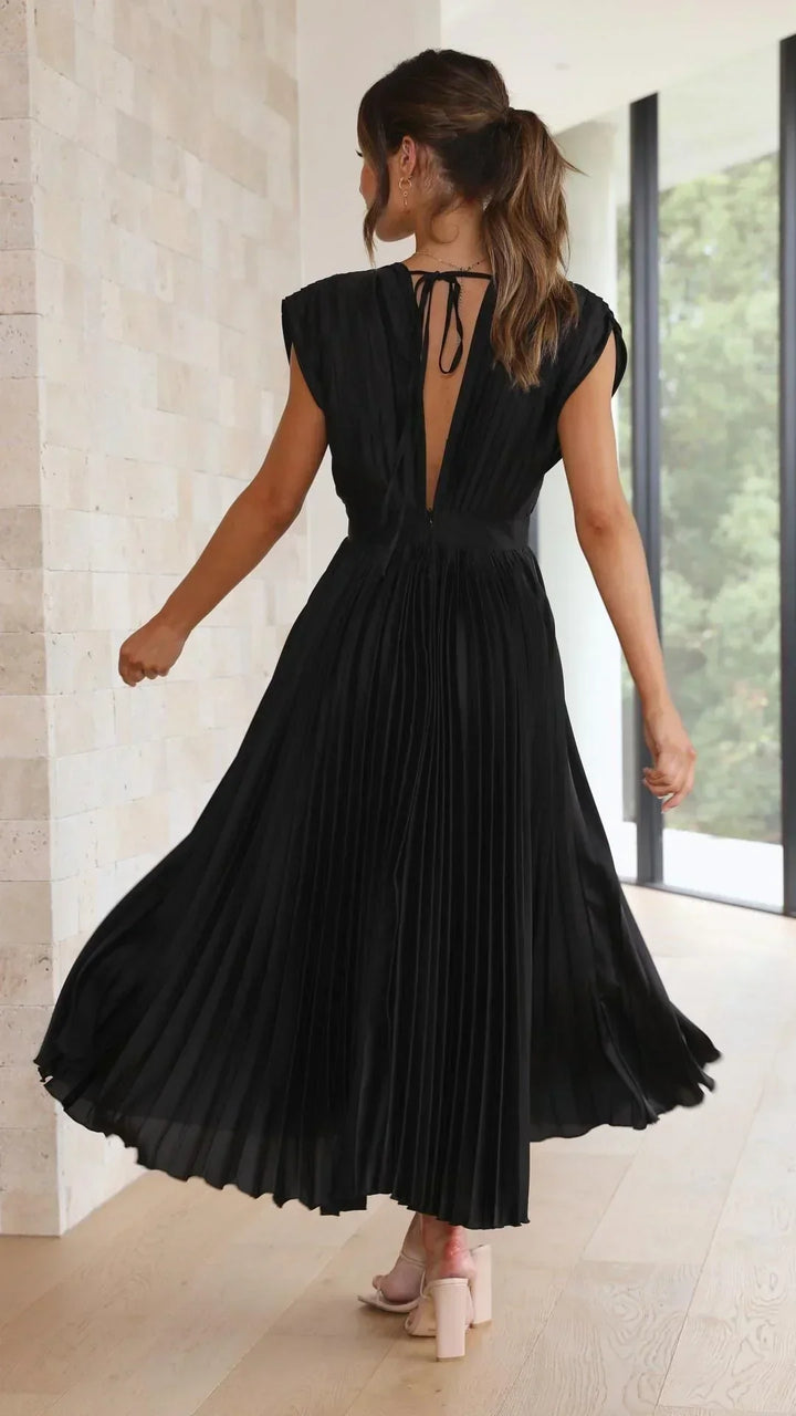 Sophisticated women's V-neck evening dress featuring an elegant tie back & flattering midi length.