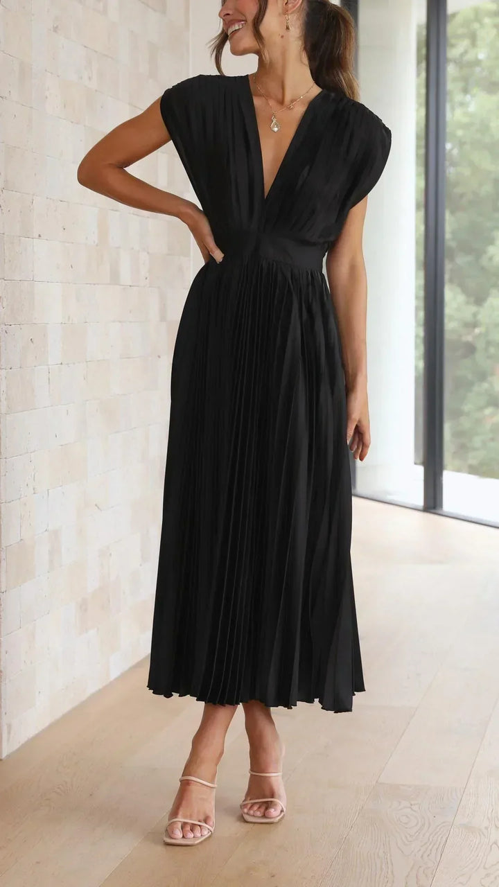 Comfortable & fashionable women's V-neck dress with an adjustable tie back for perfect fit. Summer ready.