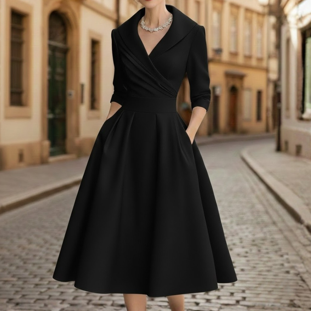 Sophisticated women's V-neck midi dress, featuring elegant three-quarter sleeves and a flattering flared design.