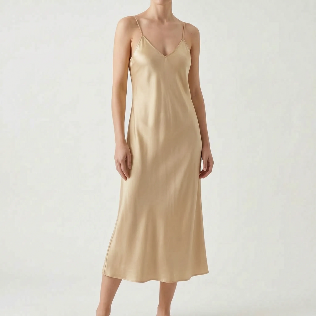 Fashionable women's V-neck slip dress. Elegant midi length, comfortable regular fit for chic style.