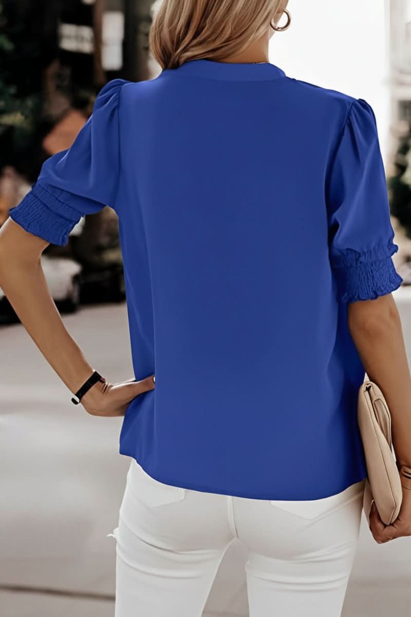 Stylish women's puff sleeve blouse, featuring a V-neck for an elegant, versatile, and casual style.