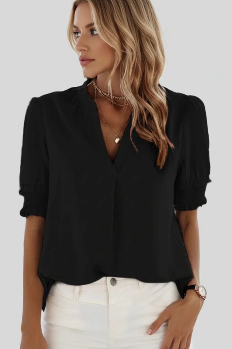 Versatile women's blouse: elegant V-neck, comfortable short puff sleeves, ideal for chic casual wear.