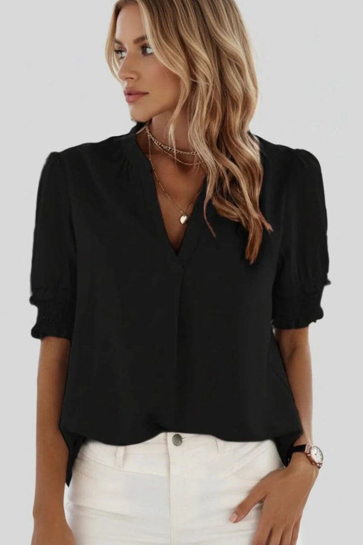 Versatile women's blouse: elegant V-neck, comfortable short puff sleeves, ideal for chic casual wear.