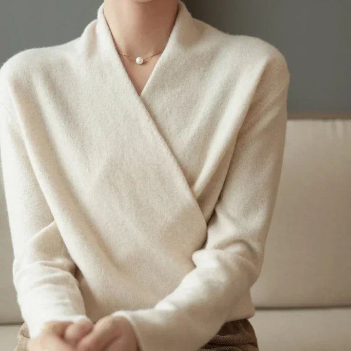 Soft knit women's V-neck pullover sweater, a comfortable and elegant top for cozy fall and winter outfits.