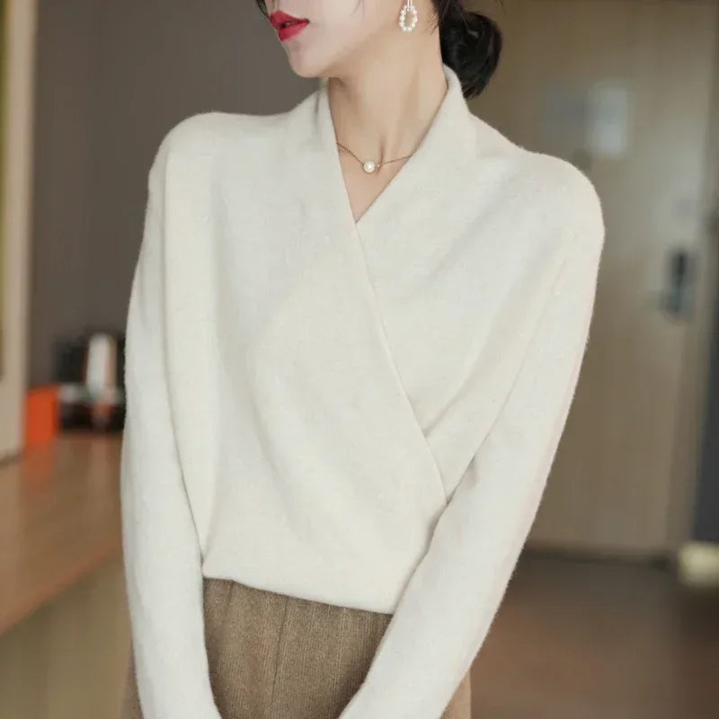 Women's V-neck pullover sweater, a sophisticated cozy knit top for versatile, elegant fall and winter style.