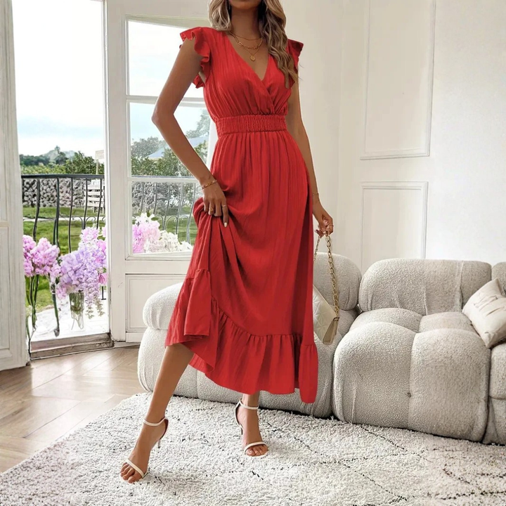 Beautiful women's V-neck maxi dress with a sophisticated ruffle trim. Ideal for elegant fashion.