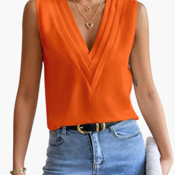 Classic style women's V-neck sleeveless blouse. An elegant and versatile top for summer fashion, work, or casual wear.