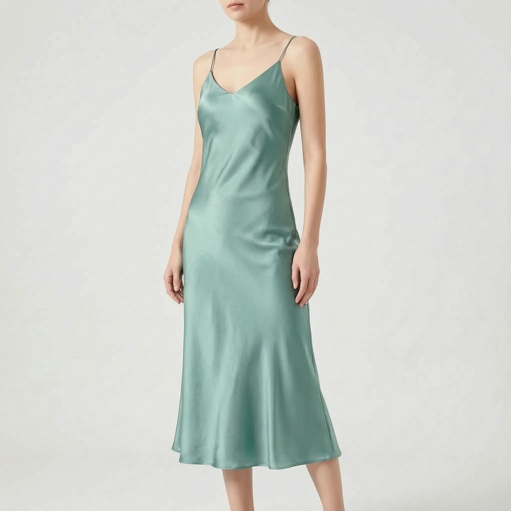 Women's elegant V-neck slip midi dress, perfect evening wear for sophisticated parties and special events.