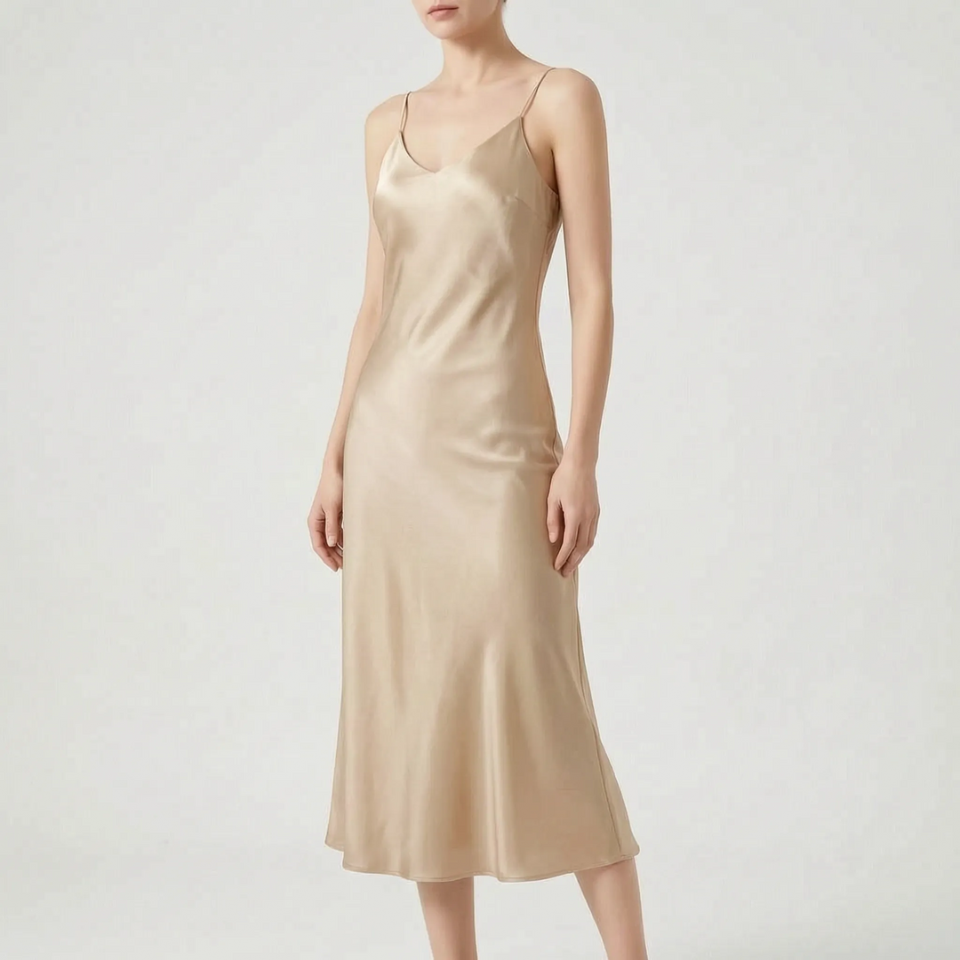 Versatile women's spaghetti strap V-neck midi slip dress, suitable for evening, cocktail, and summer events.