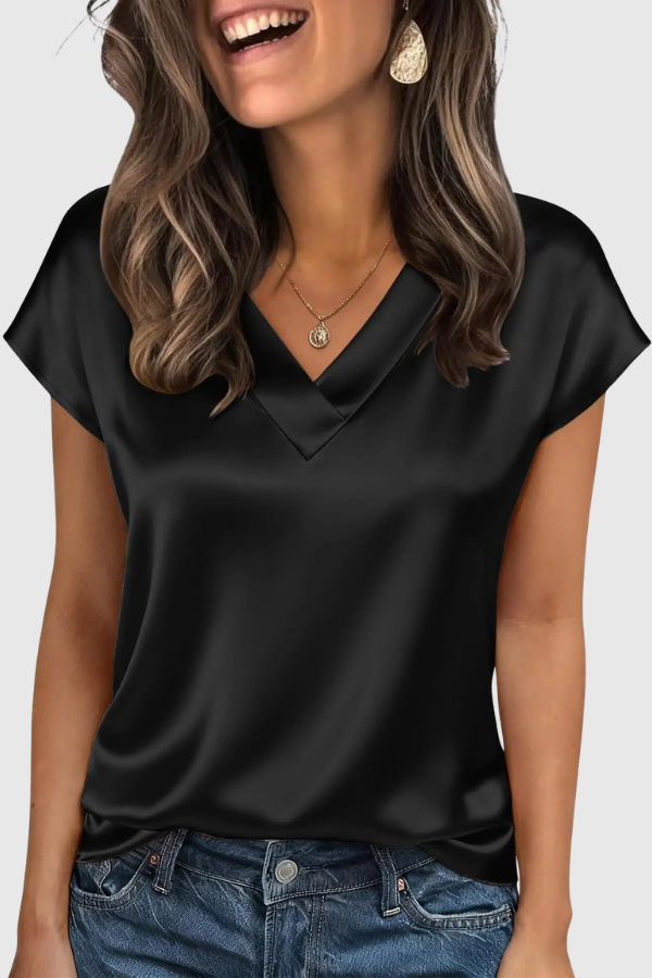 Women's comfortable V neck blouse for summer. Versatile, short sleeve top for day to evening wear.