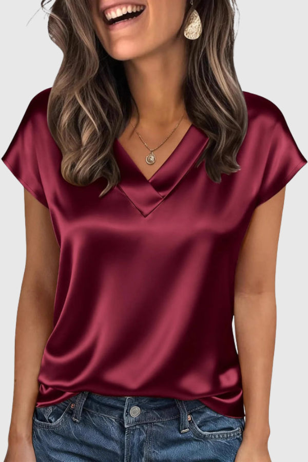 Stylish women's V neck summer shirt. Elegant, loose fit blouse, ideal for office or casual occasions.