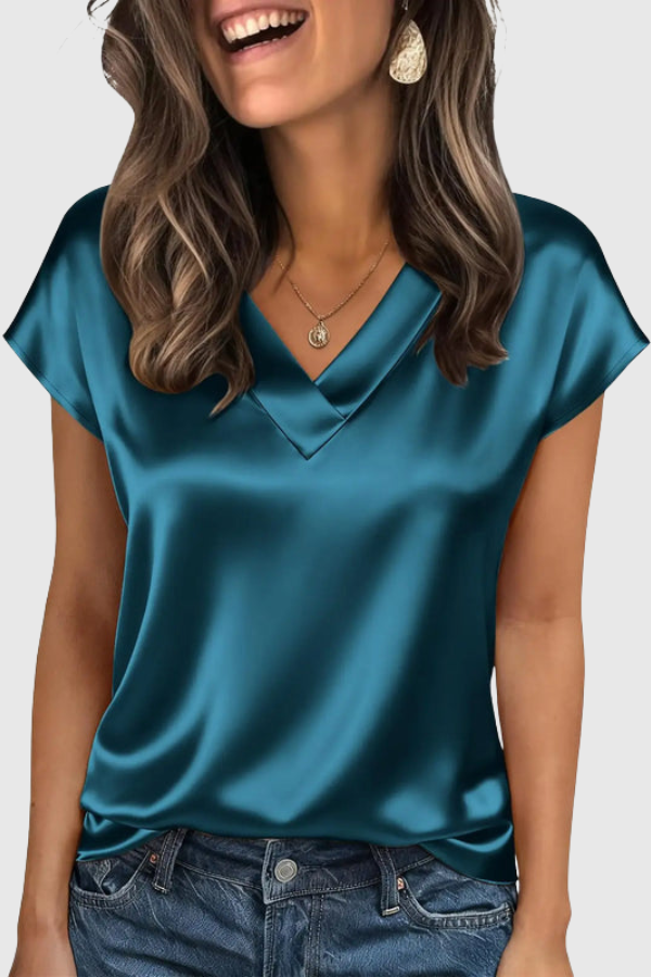 Versatile women's elegant V neck summer blouse. Casual chic short sleeve top for effortless style.